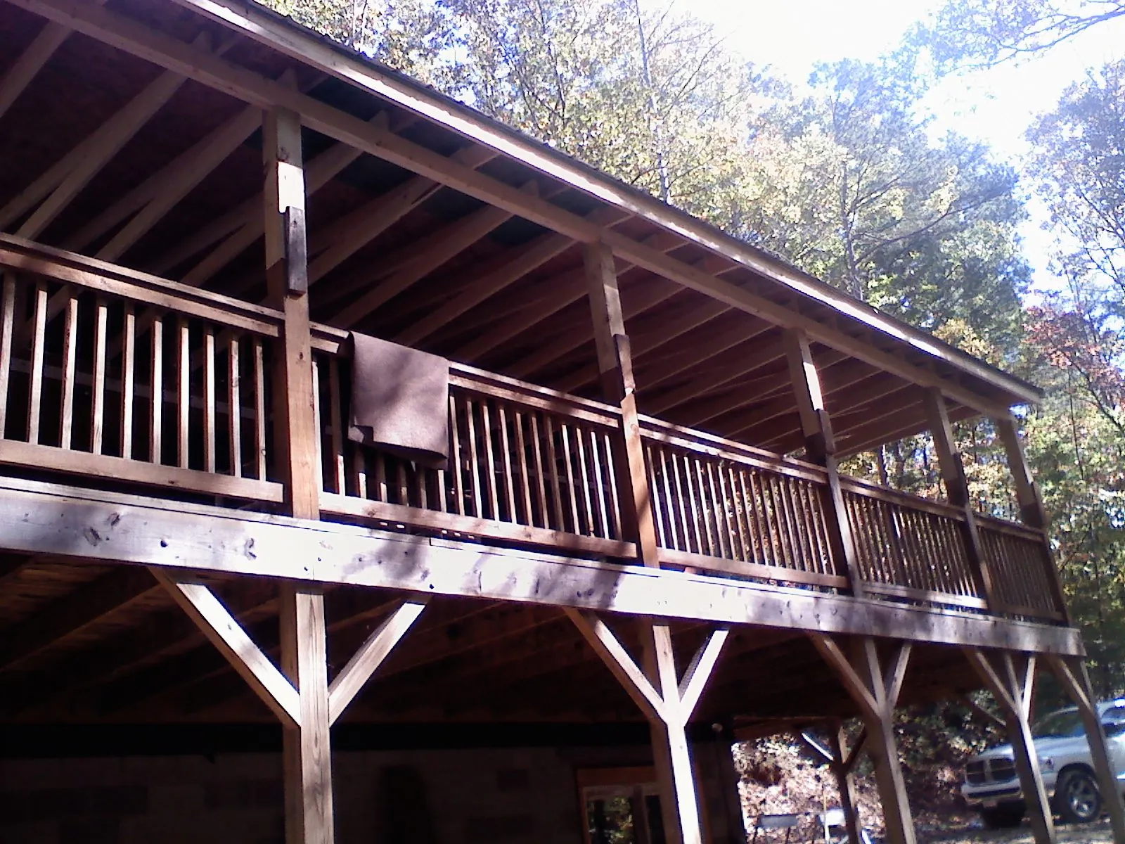 Timber framing under a new elevated porch and deck — Roof Leak Repair in Kernersville by Roofing Brothers